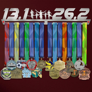 13.1 26.2 Medal Hanger holding a full row of medals on a wall