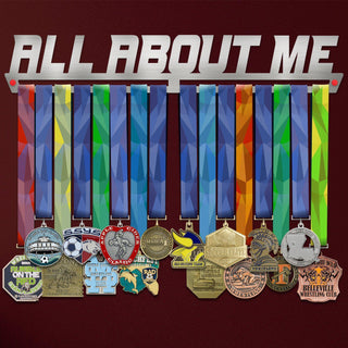 All About Me Medal Hanger holding a full row of medals on a wall