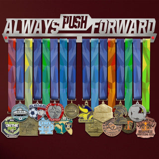 Always Push Forward Medal Hanger holding a full row of medals on a wall