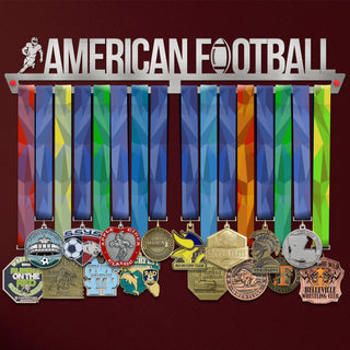 American Football Medal Hanger holding a full row of medals on a wall
