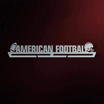 American Football Medal Hanger in laser-cut steel on a dark background