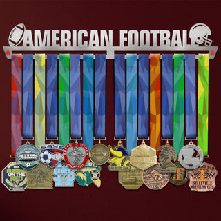 American Football Medal Hanger holding a full row of medals on a wall