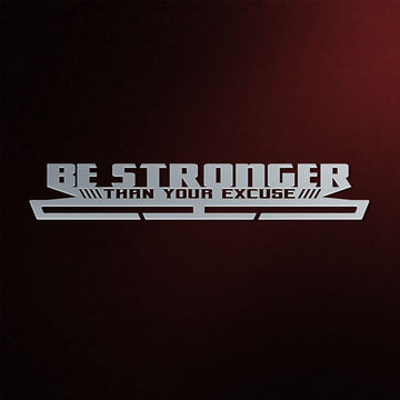 Be Stronger Than Your Excuse Medal Hanger in laser-cut steel on a dark background