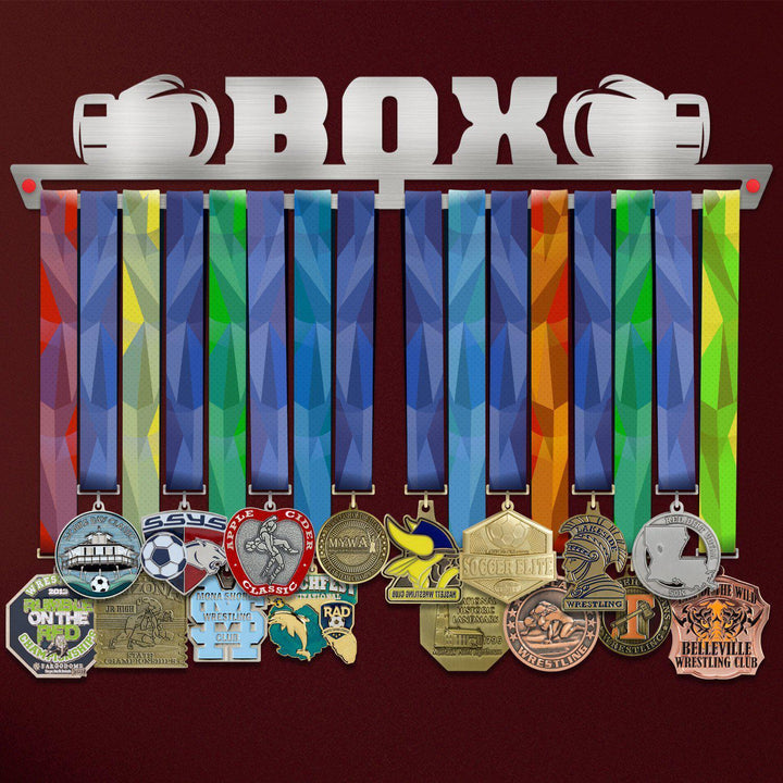 Boxing Medal Hanger holding a full row of medals on a wall