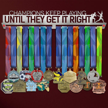 Champions Keep Playing Medal Hanger holding a full row of medals on a wall