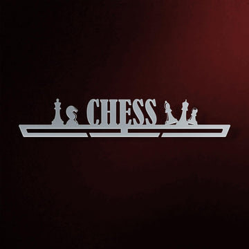 Chess Medal Hanger in laser-cut steel on a dark background