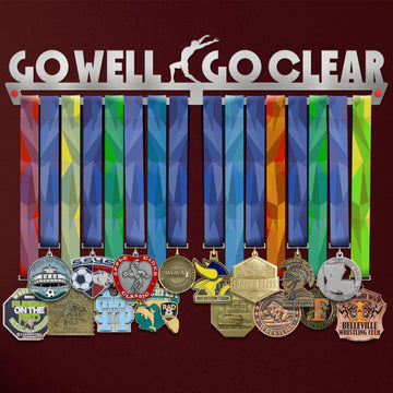 Go Well Go Clear Medal Hanger holding a full row of medals on a wall