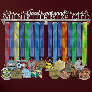 Good Is Not Good Medal Hanger holding a full row of medals on a wall