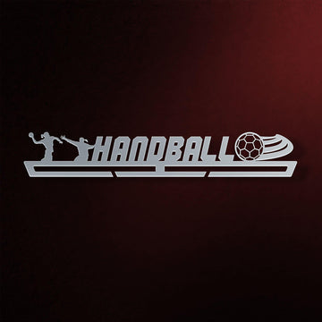 Women's Handball Medal Hanger in laser-cut steel on a dark background