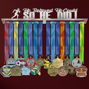 He Believed He Could So He Did Medal Hanger holding a full row of medals on a wall