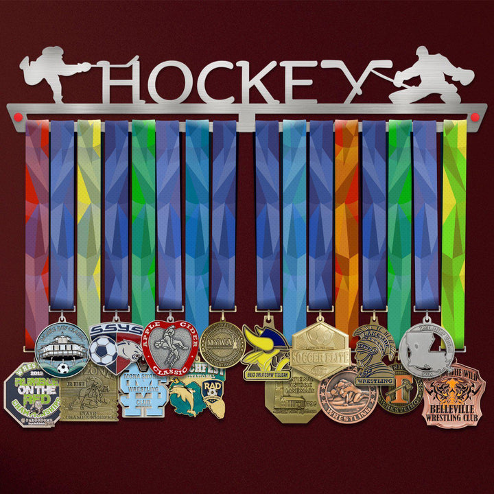 Hockey Medal Hanger holding a full row of medals on a wall