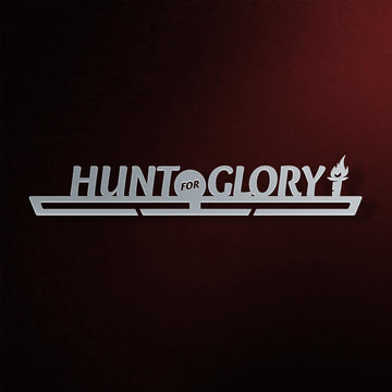 Hunt For Glory Medal Hanger in laser-cut steel on a dark background