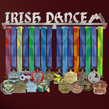 Irish Dance Medal Hanger V2 holding a full row of medals on a wall