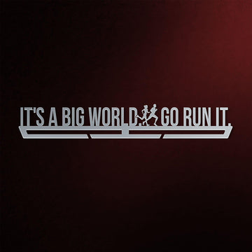 It's A Big World Go Run It Medal Hanger in laser-cut steel on a dark background