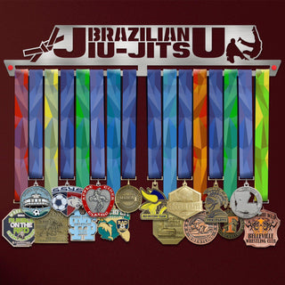 Brazilian Jiu Jitsu Medal Hanger holding a full row of medals on a wall