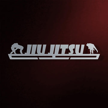 Jiu Jitsu Medal Hanger in laser-cut steel on a dark background