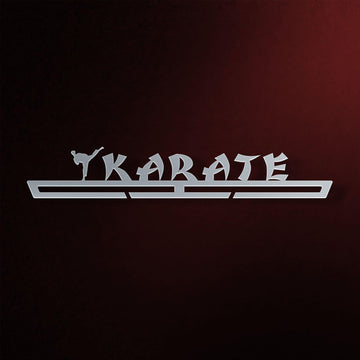 Karate Medal Hanger in laser-cut steel on a dark background