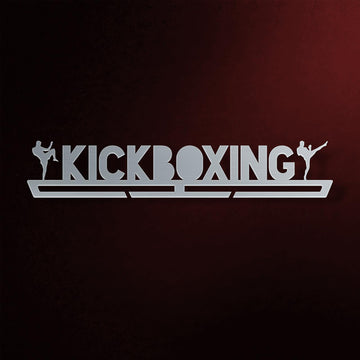 Kickboxing Medal Hanger in laser-cut steel on a dark background