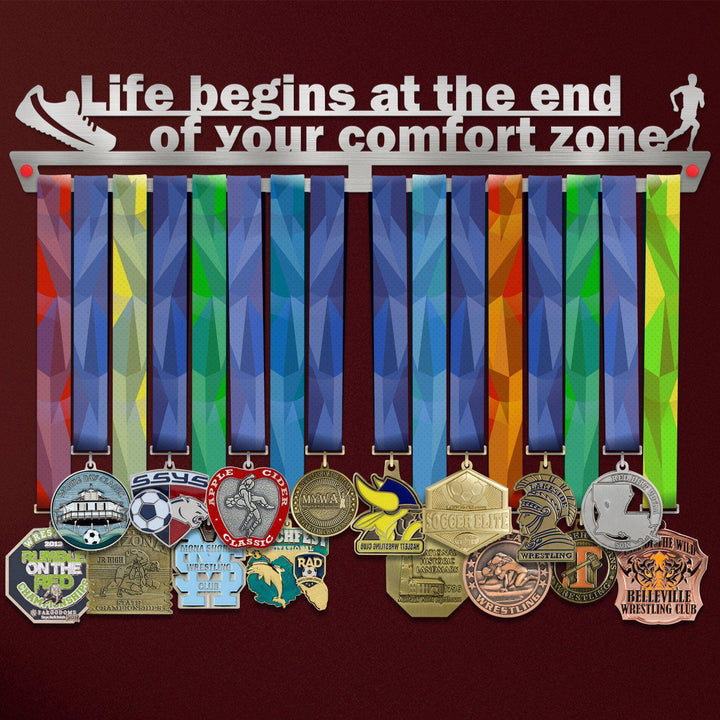 Comfort Zone Medal Hanger holding a full row of medals on a wall