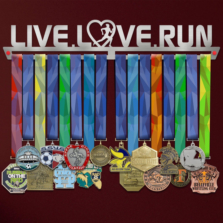 Women's Live Love Run Medal Hanger holding a full row of medals on a wall