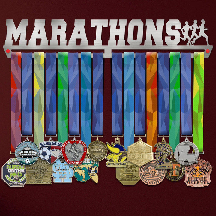 Marathon Medal Hanger holding a full row of medals on a wall