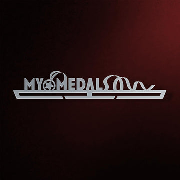 My Medals Medal Hanger in laser-cut steel on a dark background