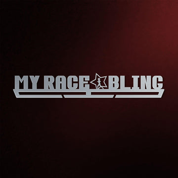 Women's My Race Bling Medal Hanger in laser-cut steel on a dark background