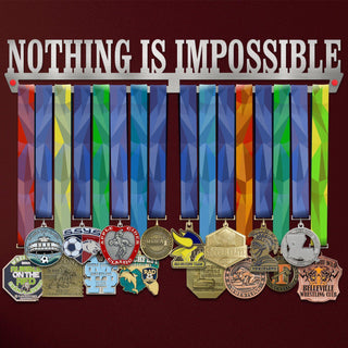 Nothing Is Impossible Medal Hanger holding a full row of medals on a wall