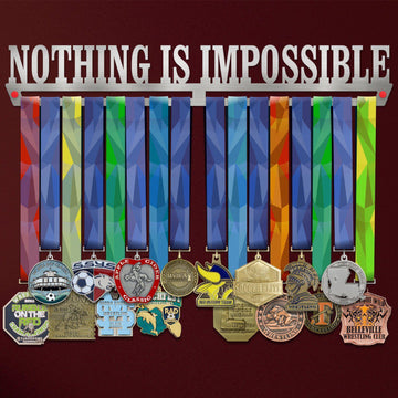 Nothing Is Impossible Medal Hanger holding a full row of medals on a wall