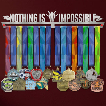 Nothing Is Impossible Medal Hanger V2 holding a full row of medals on a wall
