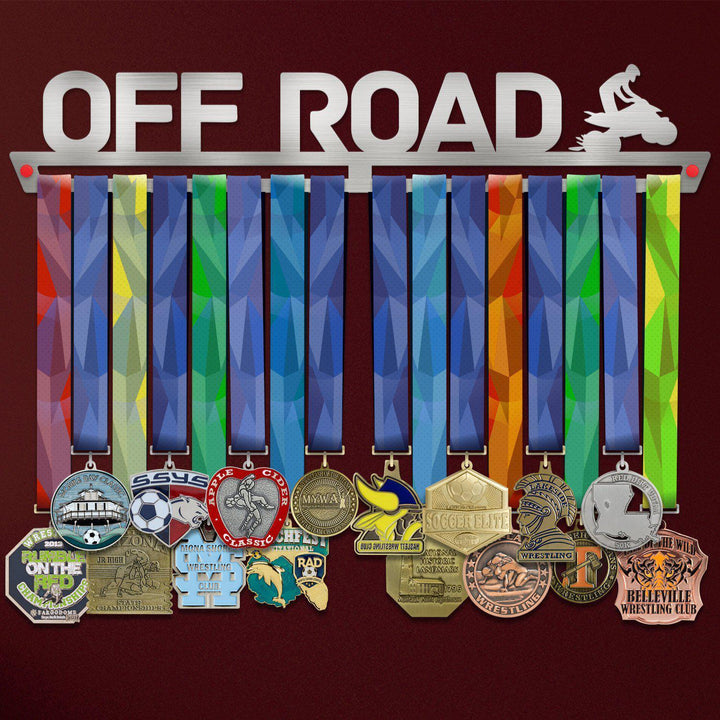 Off Road Medal Hanger holding a full row of medals on a wall