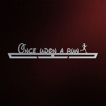 Women's Once Upon A Run Medal Hanger in laser-cut steel on a dark background