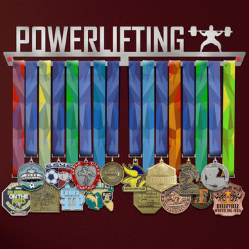 Powerlifting Medal Hanger holding a full row of medals on a wall
