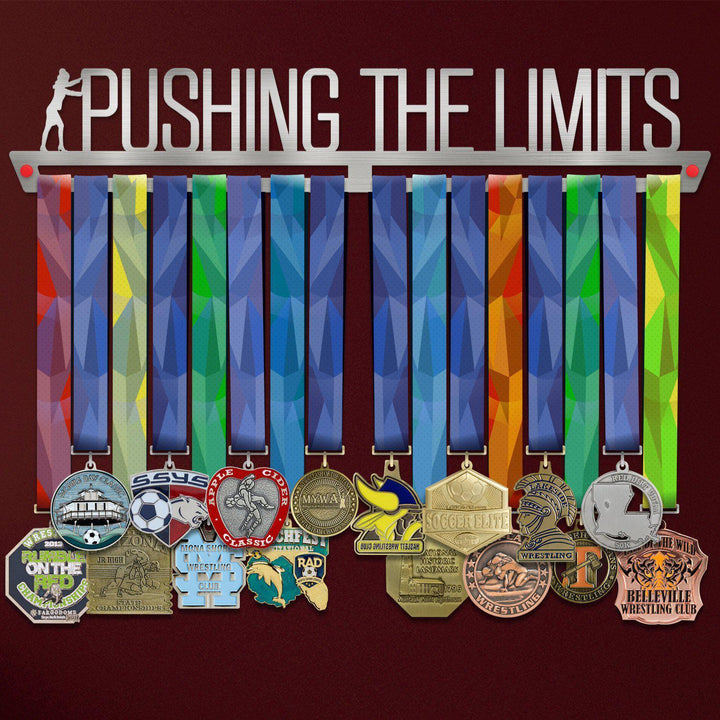 Pushing The Limits Medal Hanger holding a full row of medals on a wall