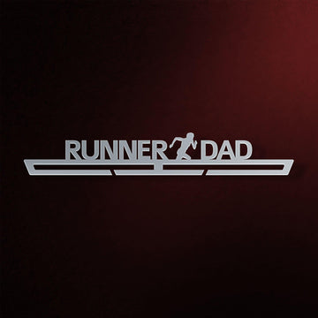 Runner Dad Medal Hanger in laser-cut steel on a dark background