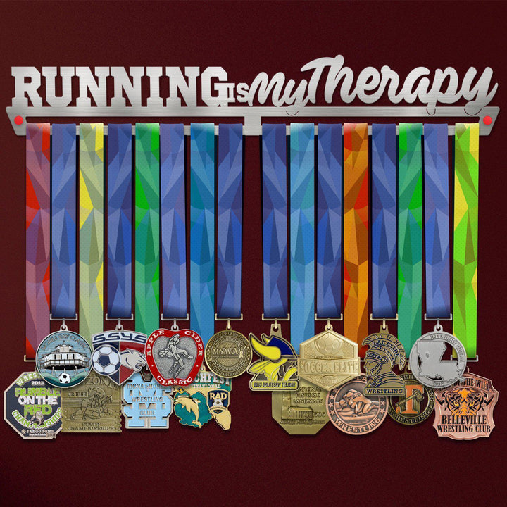 Running Is My Therapy Medal Hanger holding a full row of medals on a wall