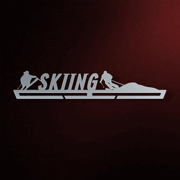Skiing Medal Hanger in laser-cut steel on a dark background