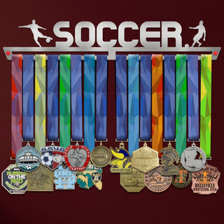 Soccer Medal Hanger holding a full row of medals on a wall