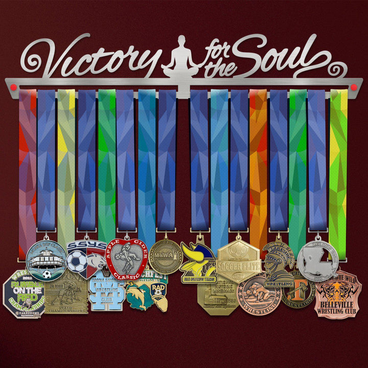 Victory For The Soul Medal Hanger holding a full row of medals on a wall