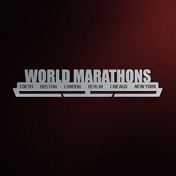 World Marathon Majors Medal Hanger in laser-cut steel on a dark background