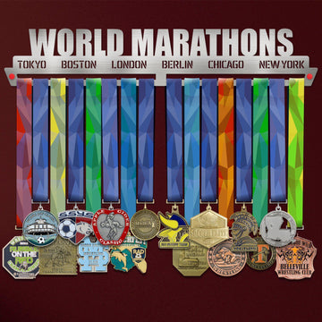 World Marathon Majors Medal Hanger holding a full row of medals on a wall