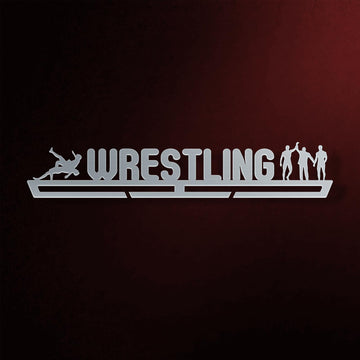 Wrestling Medal Hanger in laser-cut steel on a dark background