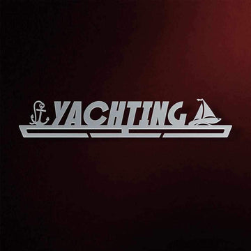 Yachting Medal Hanger in laser-cut steel on a dark background